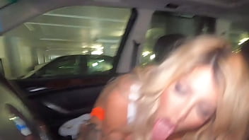 Latina waitress with tattoos gives a blowjob in a car for a generous tip